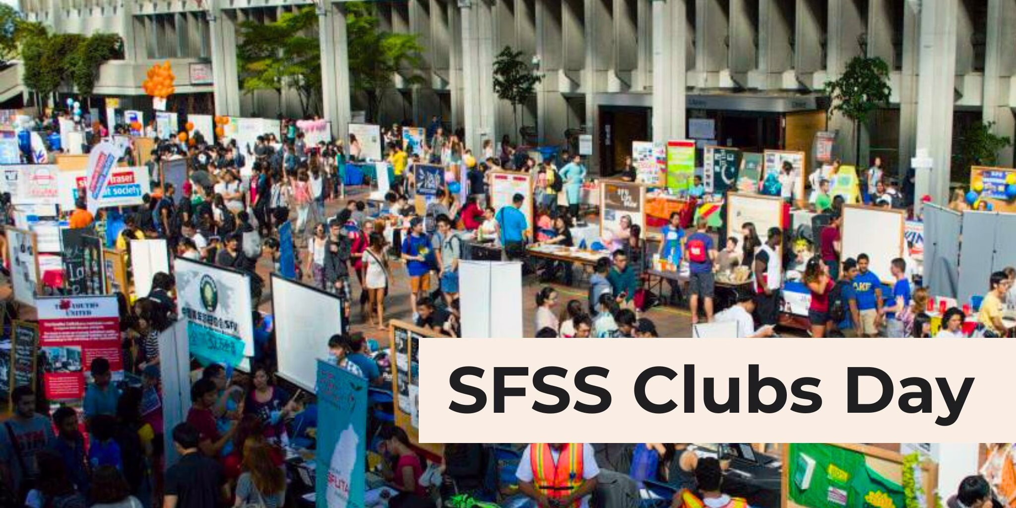 A bustling crowd packs SFU Burnaby's Convocation Mall, with several booths stationed for the SFSS Clubs Day event.