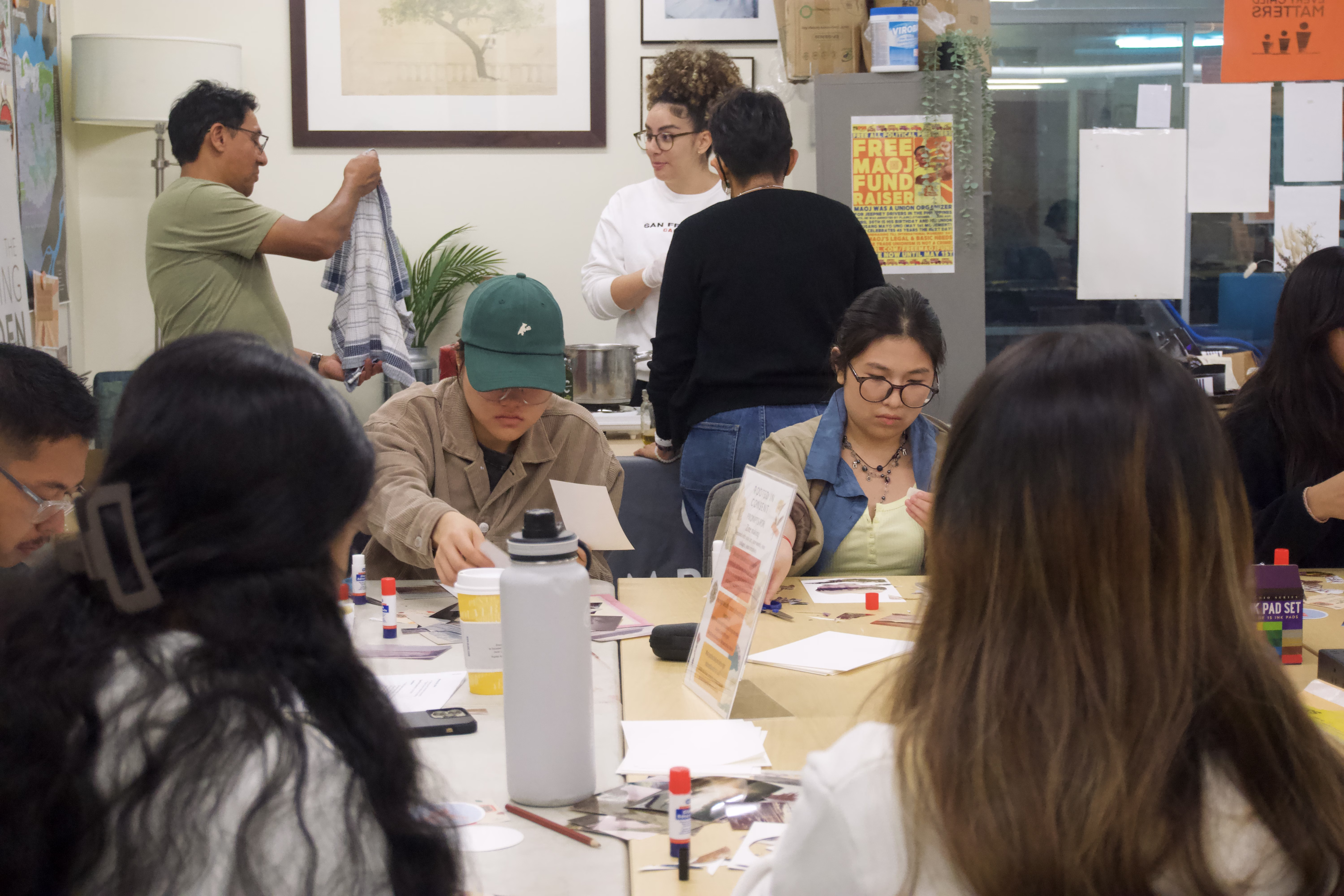 Two people sit and chat in the Embark Studio.